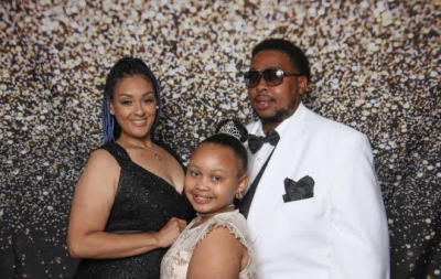 Mike Sims, his wife and daughter.