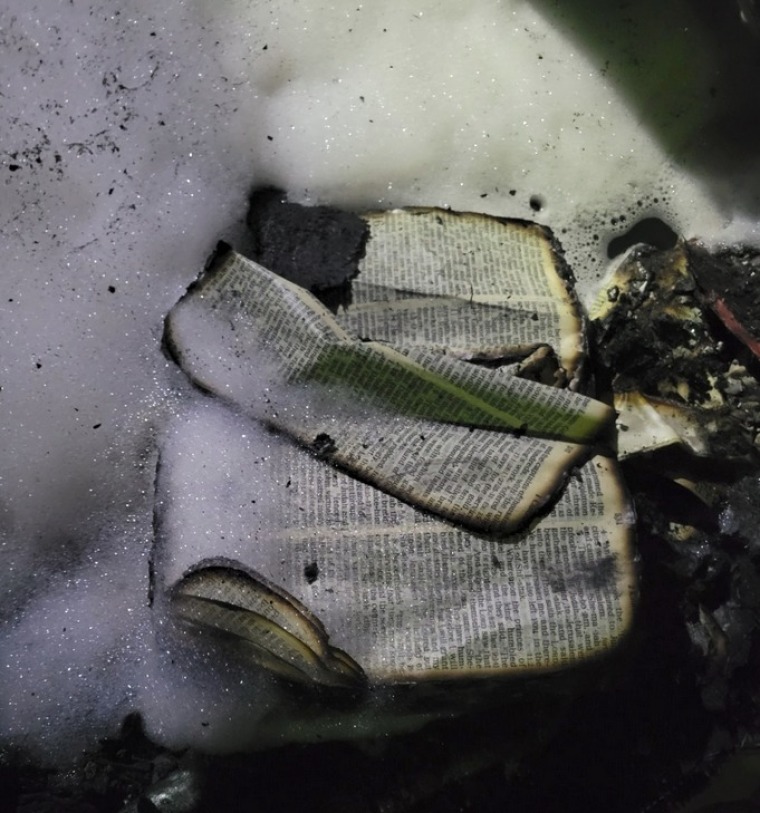 Bible spared in car fire