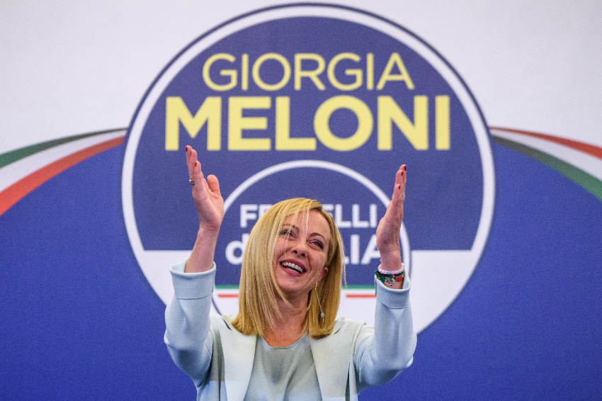 Giorgia Meloni, leader of the Fratelli d'Italia (Brothers of Italy), gestures during a press conference at the party electoral headquarters overnight, on Sept. 25, 2022, in Rome, Italy. The snap election was triggered by the resignation of Prime Minister Mario Draghi in July, following the collapse of his big-tent coalition of leftist, right-wing and centrist parties.