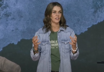 Stacie Wood of Saddleback Church preaching a sermon in October 2022. The church identifies Wood as a "pastor," even though the Southern Baptist Convention prohibits female ordination. 