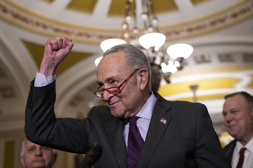 Senate Majority Leader Chuck Schumer, D-N.Y., speaks to reporters after meeting with Senate Democrats at the U.S. Capitol on Nov. 29, 2022, in Washington, D.C. The Senate passed the so-called Respect for Marriage Act, which enshrines same-sex marriage into federal law.