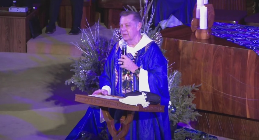 Father Michael Pfleger, the senior pastor of The Faith Community of Saint Sabina of Chicago, Illinois, addresses his congregation on Sunday, Dec. 11, 2022.