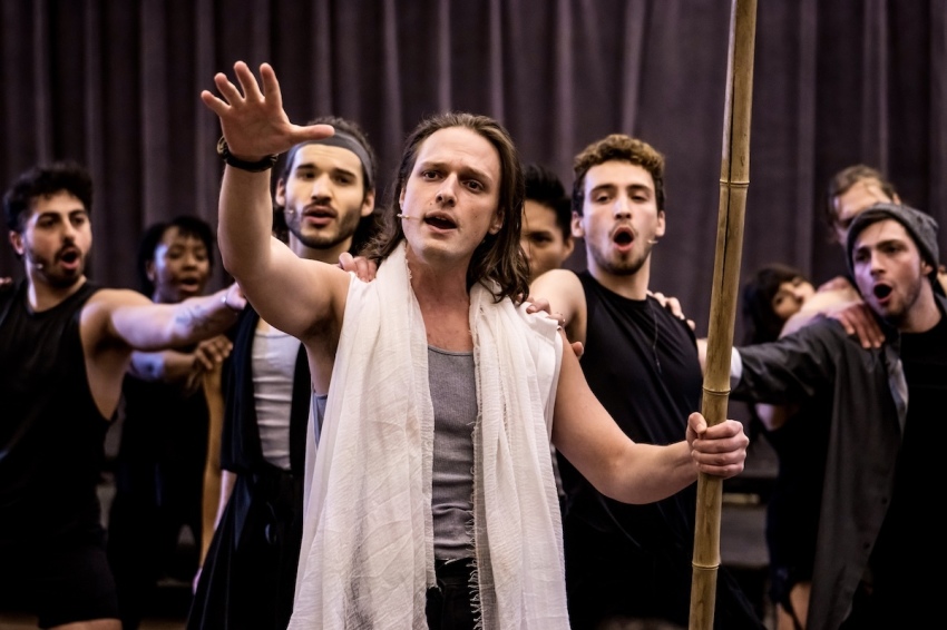 A scene from a rehearsal of "His Story, The Musical."