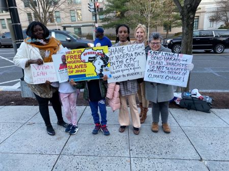 Religious freedom activists hold a protest outside the U.S. Institute of Peace in Washington, D.C., as Nigerian President Muhammadu Buhari gives a speech inside. From left to right: Gloria Puldu of The Leah Foundation, Sudanese Christian activist Mariam Ibraheem, Save the Persecuted Christians Executive Director Dede Laugesen and Faith McDonnell of Kartartismos Global.