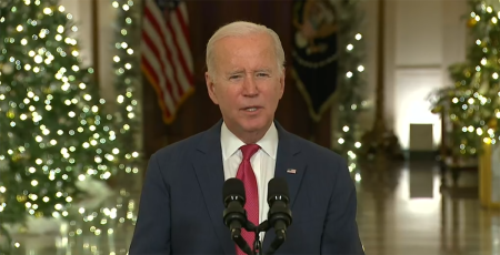 President Joe Biden delivers his Christmas address from the White House Cross Hall, in Washington, D.C., Dec. 22, 2022.