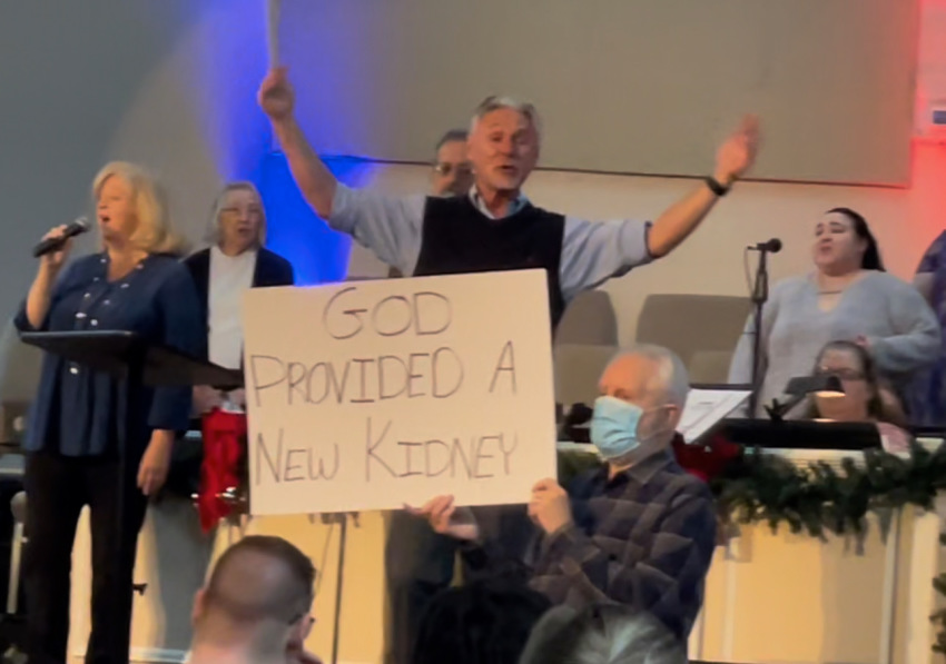 Pastor James Slick and Jack Abbott announce the news about the life-saving transplant surgery at Summit Baptist Church in Acworth, Georgia.