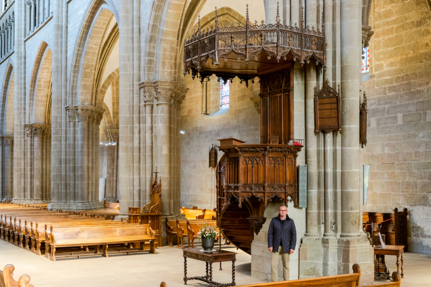 The columnist at the pulpit of St. Peter’s Cathedral in Geneva, Switzerland.