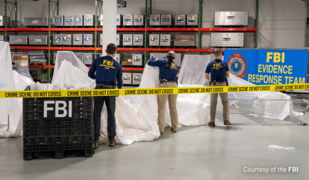 FBI special agents assigned to the Evidence Response Team process material recovered from the high-altitude balloon recovered off the coast of South Carolina.