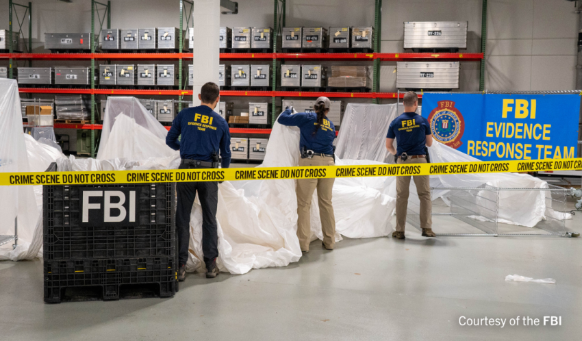 FBI special agents assigned to the Evidence Response Team process material recovered from the high-altitude balloon recovered off the coast of South Carolina.