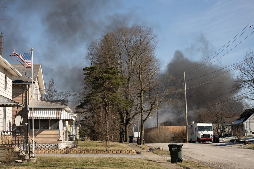Smoke rises from a derailed cargo train in East Palestine, Ohio, on February 4, 2023.