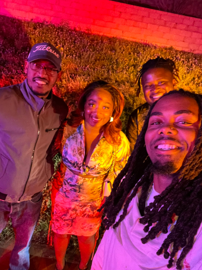 Minnesota Vikings wide receiver KJ Osborn (right) poses with an Uber driver and a couple he shared the ride with after they saved the life of a man trapped in a burning car in Austin, Texas, on March 5, 2023.