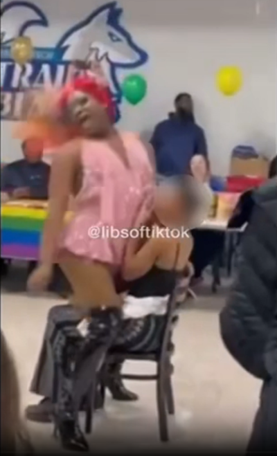 A drag queen performs a lap dance on a student at Forsyth Technical Community College on March 22.