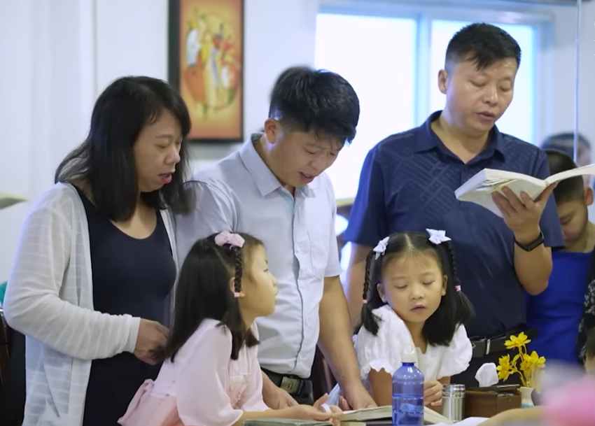 "Mayflower Church" members who fled China participate in a worship service. 