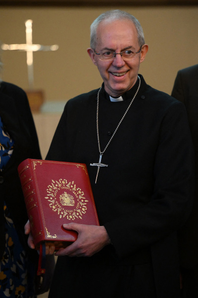 The Archbishop of Canterbury Justin Welby poses with the Coronation Bible, a specially commissioned Bible which will be used during the Coronation Service when The king takes the Coronation Oath in Lambeth Palace in London on April 20, 2023. Four copies of the Coronation Bible have been made. Following the Coronation, the Bible used in the service will be kept in the Lambeth Palace Library. Three identical copies have been produced: one will be given to The king as a personal copy, and the other two will be placed in the archives of Westminster Abbey and Oxford University Press respectively.