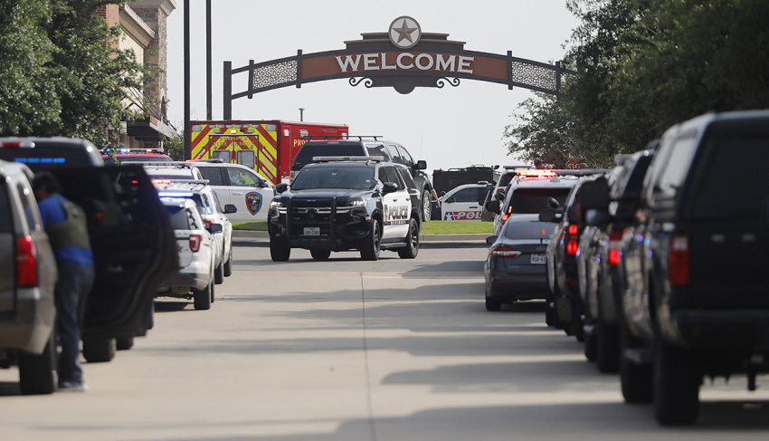 Emergency vehicles line the entrance to the Allen Premium Outlets where a shooting took place on May 6, 2023, in Allen, Texas. According to reports, a shooter opened fire at the outlet mall, injuring at least nine people who were taken to local hospitals. The police have confirmed there were fatalities but have not specified how many. The unidentified shooter was neutralized by an Allen Police officer responding to an unrelated call.