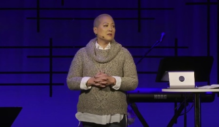 Gail Bantum, the lead pastor of the Quest Church of Seattle, Washington, preaches at a worship service held in December 2022.
