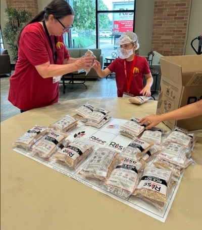 Volunteers at First United Methodist Church Richardson in Texas participate in a Rise Against Hunger event held June 14, 2023.