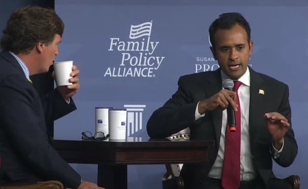 Republican presidential hopeful Vivek Ramaswamy speaks with Tucker Carlson at the Family Leadership Summit in Des Moines, Iowa, on Friday, July 14, 2023.
