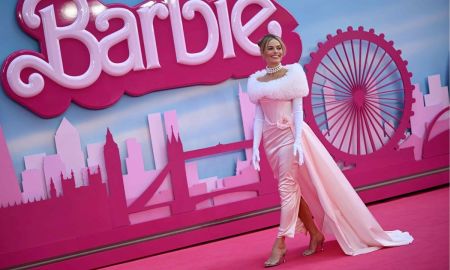 Australian actress Margot Robbie as she poses on the pink carpet during the European premiere of "Barbie" in central London on July 12, 2023.