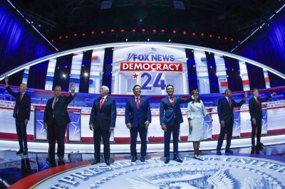 (From L) Former Governor of Arkansas Asa Hutchinson, former Governor of New Jersey Chris Christie, former US Vice President Mike Pence, Florida Governor Ron DeSantis, entrepreneur and author Vivek Ramaswamy, former Governor from South Carolina and UN ambassador Nikki Haley, US Senator from South Carolina Tim Scott and North Dakota Governor Doug Burgum arrive onstage for the first Republican Presidential primary debate at the Fiserv Forum in Milwaukee, Wisconsin, on August 23, 2023. (Photo by KAMIL KRZACZYNSKI / AFP) (Photo by KAMIL KRZACZYNSKI/AFP via Getty Images)