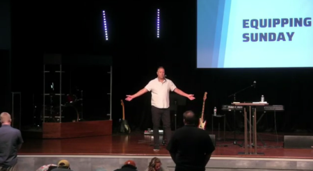Pastor Tim Darnell preaches during a service at Hill Country Church in San Marcos, Texas, August 27, 2023.