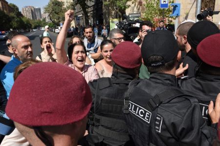 People take part in the anti-government rally in downtown Yerevan on September 22, 2023, following Azerbaijani military operations against Armenian separatist forces in Nagorno-Karabakh.