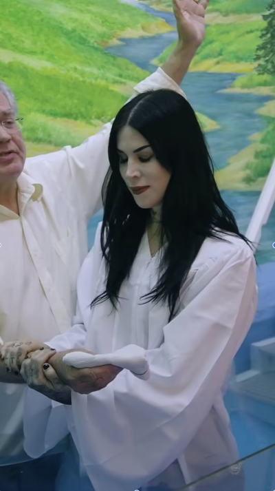 Celebrity tattoo artist Kat Von D gets baptized at an Indiana church as seen in a video posted to Instagram on Oct. 3, 2023.