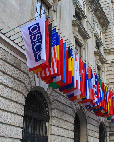 Flags of several nations and the Organization for Security and Co-operation in Europe seen during the Human Dimension Implementation Conference in Warsaw, Poland, on October 6, 2023.