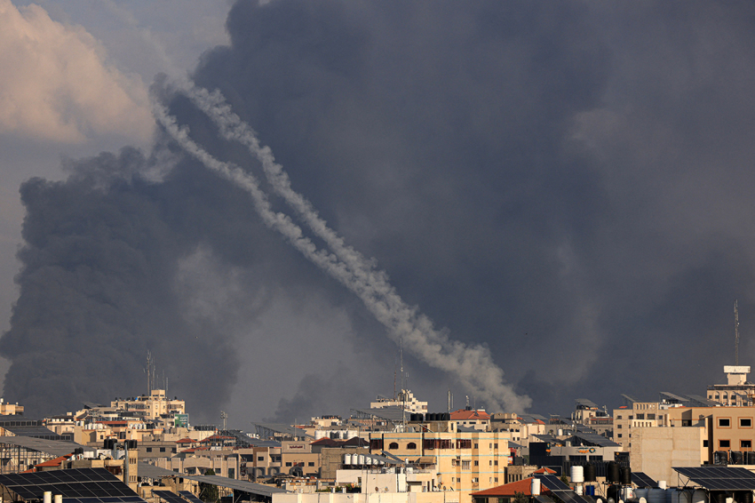 A salvo of rockets is fired by Palestinian militants from Gaza towards Israel on October 10, 2023. Israel said it recaptured Gaza border areas from Hamas as the war's death toll passed 3,000 on October 10, the fourth day of grueling fighting since the Islamists launched a surprise attack.