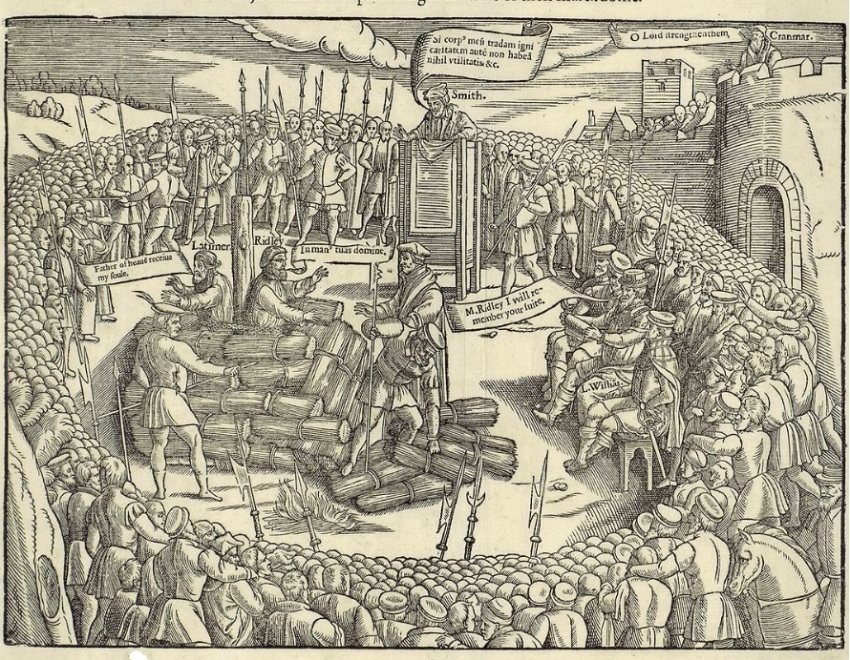 English Protestants Hugh Latimer and Nicholas Ridley being burned at the stake in October 1555.