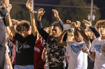Thousands worship at the Fields of Faith event held at the Lakeside High School Stadium of Hot Springs, Arkansas, on Wednesday, Oct. 11, 2023. Fields of Faith is overseen by the Fellowship of Christian Athletes.