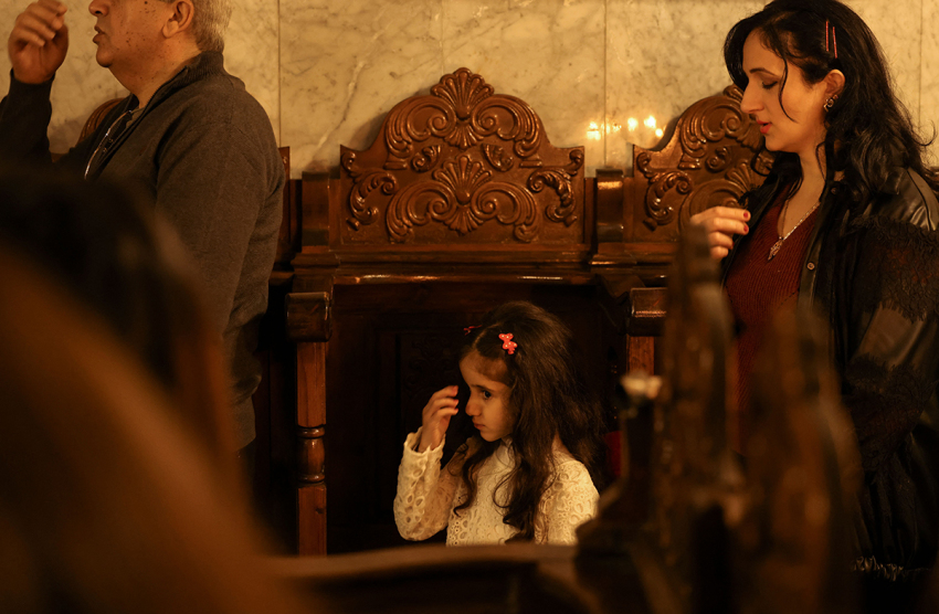 Palestinian Christians attend the Orthodox Christmas mass at the Church of Saint Porphyrius in Gaza City on January 7, 2023.