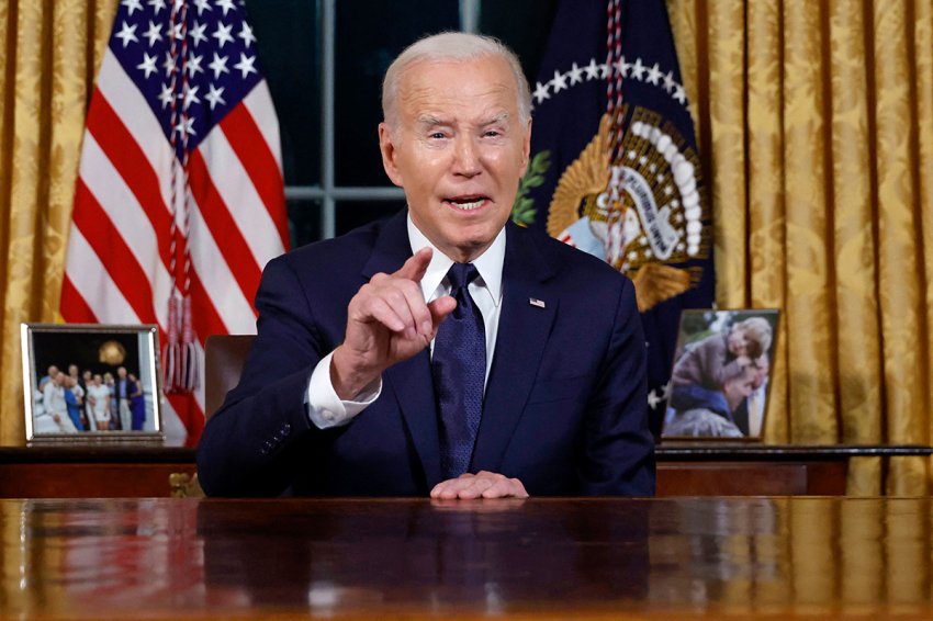 U.S. President Joe Biden addresses the nation on the conflict between Israel and Gaza and the Russian invasion of Ukraine from the Oval Office of the White House in Washington, D.C., on October 19, 2023. President Joe Biden delivered a rare Oval Office speech urging Americans to back military aid for Israel and Ukraine at what he calls a perilous moment for democracy around the globe.