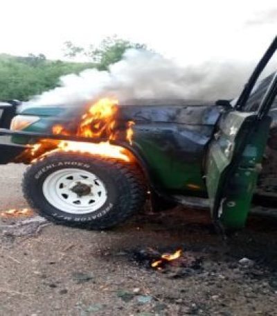 Vehicle of Christian tour guide Eric Alyai set ablaze after he was slain along with two tourists in western Uganda on October 17, 2023.