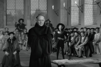 A scene from the 1953 movie "Martin Luther," starring Niall MacGinnis as the Protestant Reformation leader.