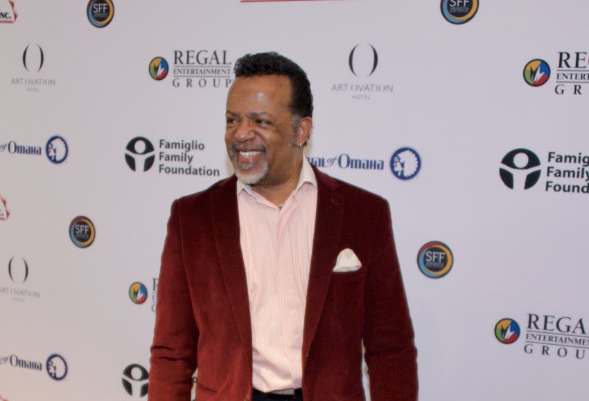 Bishop Carlton Pearson poses for photos at the premiere of the Netflix project "Come Sunday" in 2018.