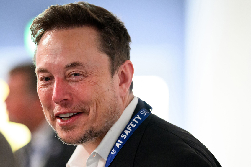 SpaceX, X (formerly known as Twitter), and Tesla CEO Elon Musk reacts during the UK Artificial Intelligence (AI) Safety Summit at Bletchley Park, in central England, on November 1, 2023. (Photo by Leon Neal / POOL / AFP) (Photo by LEON NEAL/POOL/AFP via Getty Images)