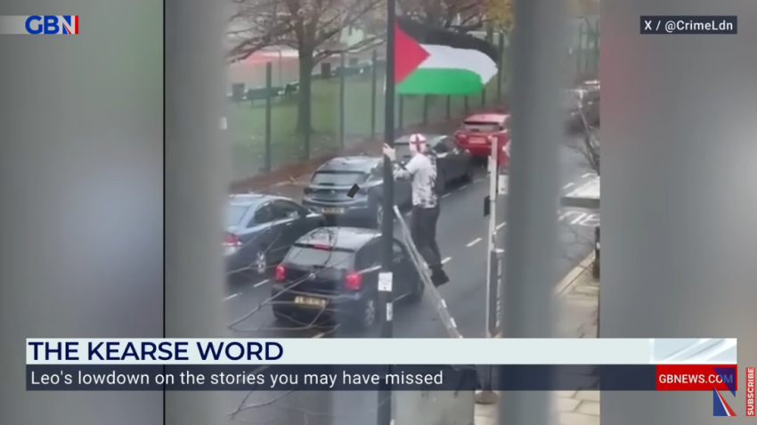 A screenshot of a British man taking down a Palestinian flag in a London borough.