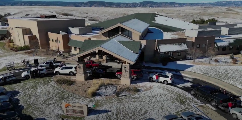 Cars are parked outside the Church of the Rock, also known as the Rock Church, a nondenominational congregation in Castle Rock, Colorado.
