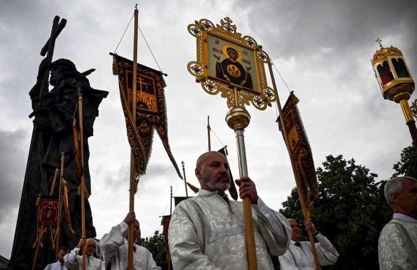 Russian Orthodox clergy participates in a procession and a prayer service marking the 1035th anniversary of the Baptism of Rus, the ancient word for Russia, at the monument to Vladimir the Great near the Kremlin in central Moscow on July 28, 2023.
