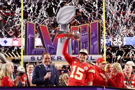 Patrick Mahomes (#15) of the Kansas City Chiefs holds the Lombardi Trophy after defeating the San Francisco 49ers 25-22 during Super Bowl LVIII at Allegiant Stadium on Feb. 11, 2024 in Las Vegas, Nevada.