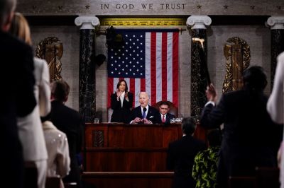 President Joe Biden delivers the annual State of the Union address before a joint session of Congress in the House chamber at the U.S. Capital building on March 7, 2024, in Washington, D.C. Seated to the right of Biden is Speaker of the House Mike Johnson. Vice President Kamala Harris stands to the left of Biden.