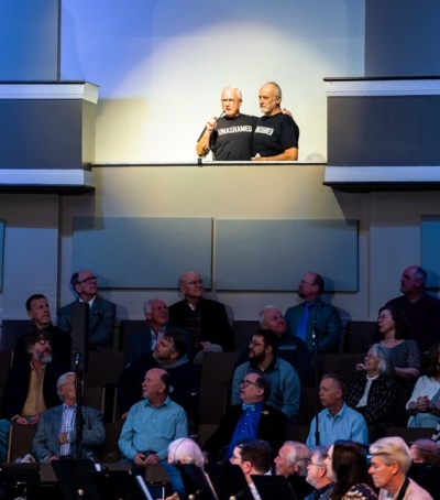 Attendees look on as one of 93 baptisms takes place at First Baptist Church of Hendersonville, Tennessee, on Sunday, March 10, 2024.