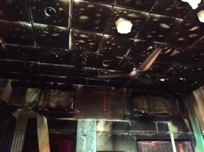 Charred interior of church building burned in Gujar Khan, Rawalpindi District, Pakistan on March 30, 2024.