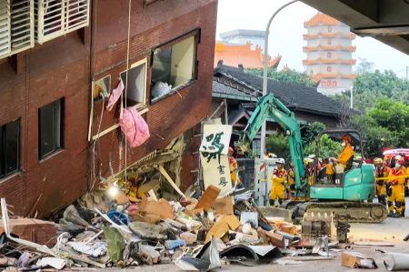 This frame grab from AFPTV video taken on April 3, 2024 shows rescue workers searching for survivors at the damaged Uranus Building in Hualien, after a major earthquake hit Taiwan's east. A major 7.4-magnitude earthquake hit Taiwan's east on the morning of April 3, prompting tsunami warnings for the self-ruled island as well as parts of southern Japan and the Philippines.