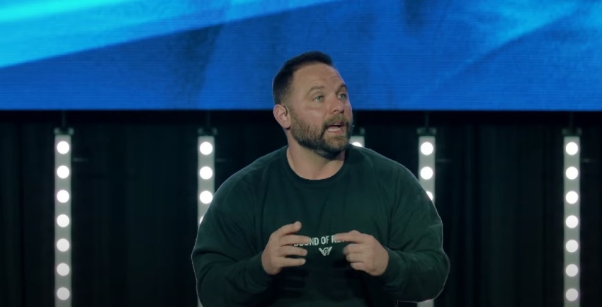 Pastor Jordan Green of Pursuit Church in Denver, North Carolina, preaching a sermon in March 2024.