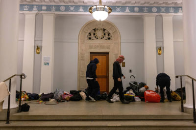 Demonstrators from the pro-Palestine encampment on Columbia's Campus barricade themselves inside Hamilton Hall, an academic building which has been occupied in past student movements, on Tuesday, April 30, 2024 in New York City. Pro-Palestinian demonstrators marched around the