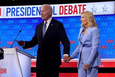 U.S. President Joe Biden walks off with first lady Jill Biden following the CNN Presidential Debate at the CNN Studios on June 27, 2024 in Atlanta, Georgia.