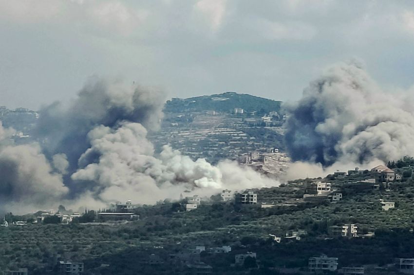Smoke billows from the site of an Israeli air strike in the Lebanese village of Jibal el Botm, near the Lebanon-Israel border, on September 23, 2024. The Israeli military on September 23 told people in Lebanon to move away from Hezbollah targets and vowed to carry out more "extensive and precise" strikes against the Iran-backed group. 