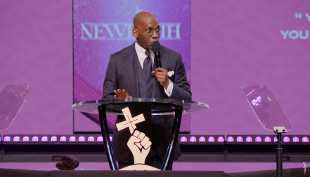 Pastor Jamal Bryant, leader of New Birth Missionary Baptist Church in Stonecrest, Ga., preaches to his congregation on Oct. 20, 2024.